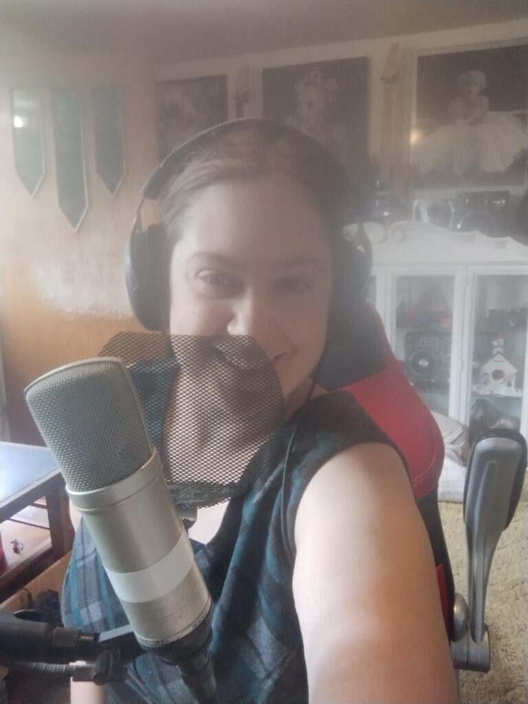 Emily recording her songs in studio